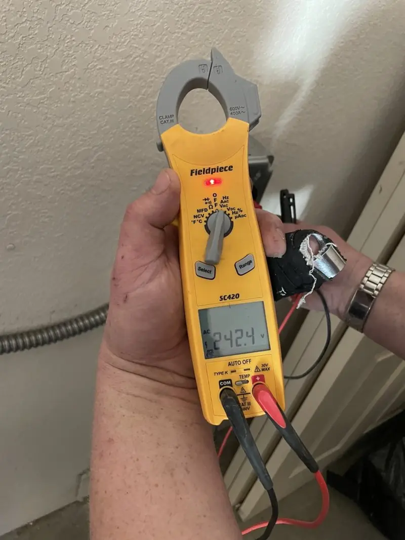 Voltage testing with clamp meter during Outlet Installation in Barnwell